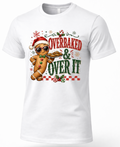 White Overbaked and Over It Christmas shirt featuring festive gingerbread man holding a tray of cookies.