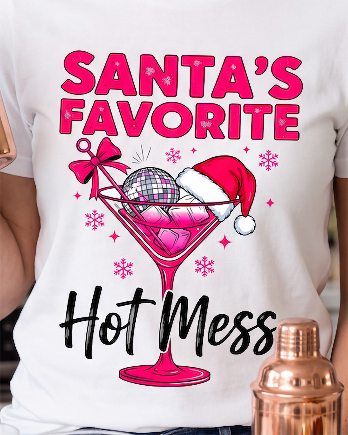 Close-up of Santa’s Favorite Hot Mess holiday cocktail design on white shirt.