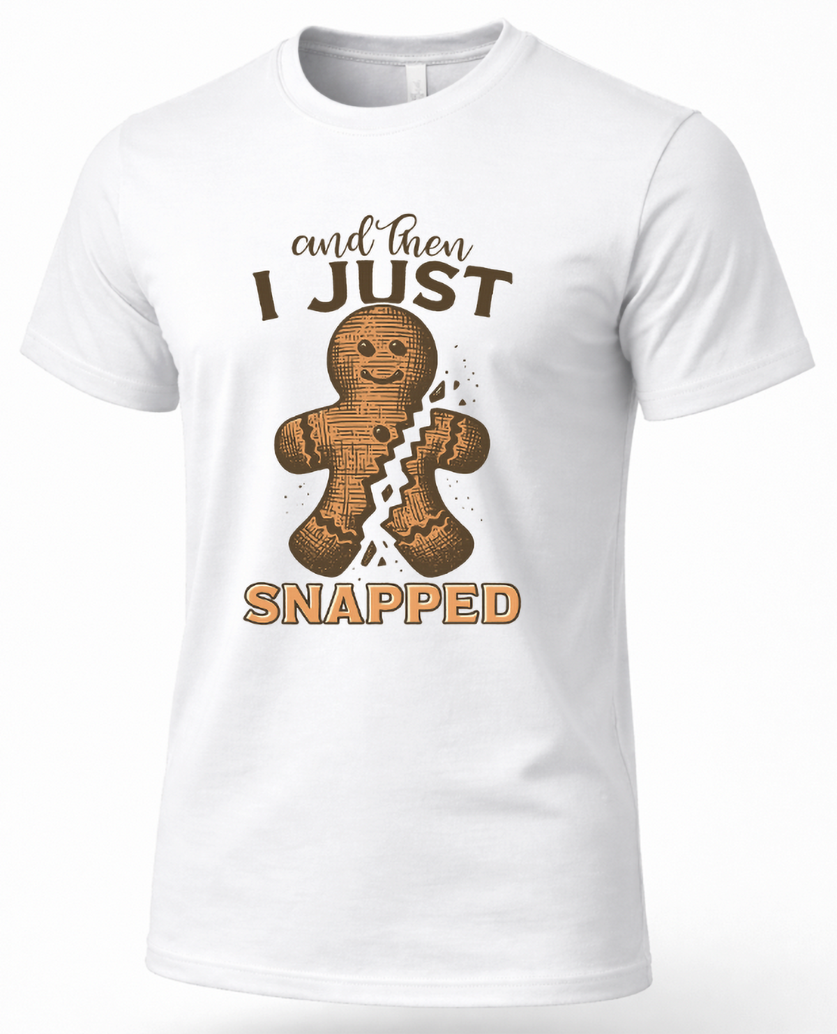 White Mockup: White unisex Christmas graphic tee featuring a broken gingerbread man and the phrase And Then I Just Snapped.
